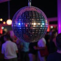 Vibrant disco ball at a glamorous event party scene photo