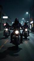 Three mysterious ominous hooded riders on motorcycles cruise through the night in a spinetingling thrilling scene photo