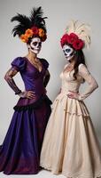 A Da de Los Muertos depiction of both a Male and Female Catrina adorned with sugar skull makeup photo