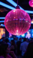 A closeup image featuring a lively disco scene against a backdrop of vibrant neon lights and a sparkling pink disco ball photo