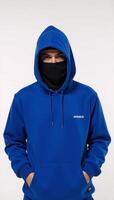 Image of a hooded hacker figure clad in a blue hoodie on a white backdrop photo