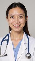 A smiling doctor in medical uniform wearing a friendly demeanor photo
