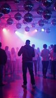 Vibrant disco balls illuminate a neonhazed futuristic dance floor for party and nightlife themes photo