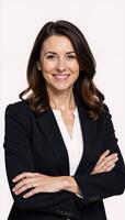 A professional businesswoman exudes confidence with subtle makeup and stylishly wavy locks photo