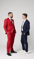 A financial advisor confidently explains retirement fund diversification to a Gen Z entrepreneur wearing red attire photo