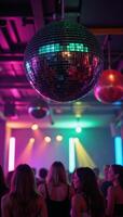 Vibrant disco ball lights highlight an abstract retroinspired nightclub scene for celebrations and music events photo