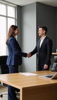 Modern business handshake scene with colleagues in the background Office Environment photo