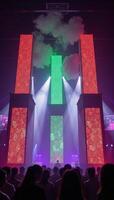 A vibrant rainbow laser show illuminates a bustling nightclub scene filled with dancing people and colored lights on a dimly lit dance floor photo