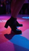 Illustrated scene featuring a lively dancefloor under vibrant lights showcasing a dancer in black boots photo