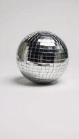 Disco Ball Icon Silhouette on White Background Shimmery DanceThemed photo
