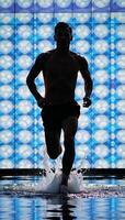 Man runs amidst dotfilled background portrayed as if submerged in water photo