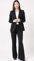 Businesswoman in suit against white backdrop photo