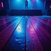 Neonlit empty rave dance floor at nighttime photo