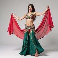 Captivating belly dancer performing gracefully in traditional costume photo