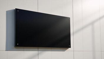 Minimalist scene blank black billboard on modern tiled wall illuminated by sunshine monochrome minimalistic simple photo