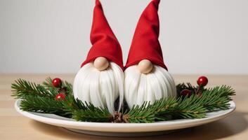 Festive Thanksgiving table features two Christmasthemed gnome figurines wearing red hats surrounded by pine and holly decorations photo