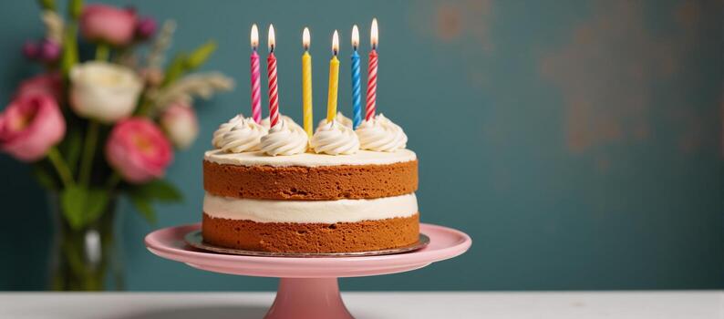 A birthdaythemed table setting with decorative elements and backdrop photo