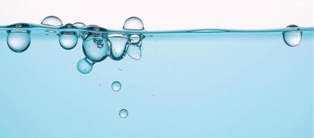 Top view of bubbly water in a blue basin against a white backdrop Isolated photo
