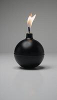 Isolated image black round bomb with burning fuse photo