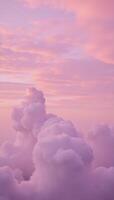 A soft pastel image featuring pink clouds above a serene landscape photo