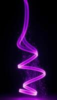 Bold radiant purple beams with shimmery particles against a dark backdrop photo