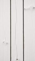 Rustic white wooden background with classic grunge texture ideal for various design photo and creative uses