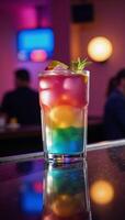 A Pride cocktail is depicted against a blurred nightclub background Nightlife Scene photo