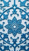 Decorative abstract design showcasing bluetoned Islamic motifs and floral patterns photo