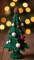 Knitted Christmas tree set against festive bokeh background holiday craft design photo