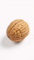 Isolated walnut nut with full depth of field on white background photo