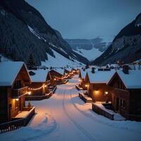Snowy village glows with festive lights during winter nightfall photo
