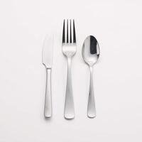 Isolated fork and knife set against white backdrop with sharp focus photo
