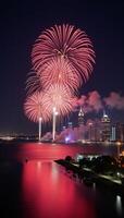 A captivating richlyhued depiction of fireworks above the city photo