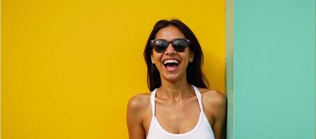 Excited black Gen Z woman with sunnies and shocked expression in front of a brightyellow background promoting summer sales and travels photo