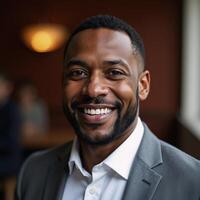 Smiling African American man looks into the camera photo
