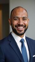 A successful African American business executive smiles confidently photo