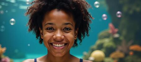 Vibrant underwater setting showcases an African American woman with a playful expression ideal for creative or romantic motifs photo