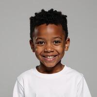 African American Boy with Curly Hair Wearing White TShirt Mockup Grey Background photo
