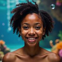 Vibrant underwater setting showcases an African American woman with a playful expression ideal for creative or romantic motifs photo