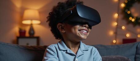 Cheerful AfricanAmerican child in pajamas using VR headset at Christmas time home setting photo