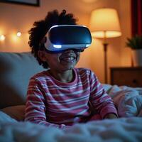 Cheerful AfricanAmerican child in pajamas using VR headset at Christmas time home setting photo
