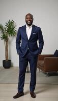 Confident black man smiling at work photo