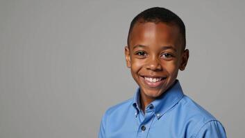 Portrait of a cheerful African American youngster donning a blue top photo