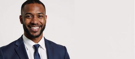 Young African American Businessman with a Smile isolated against a pure white backdrop photo
