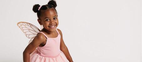 Isolated on white background happy cute African American girl wearing a costume featuring butterfly wings photo