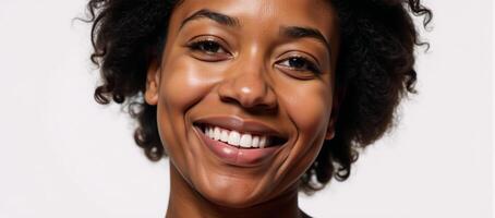 Smiling AfricanAmerican woman isolated against white background photo