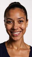 Smiling AfricanAmerican woman isolated against white background photo