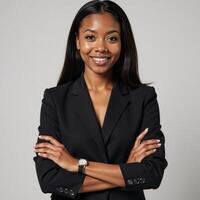Young African American woman posed with crossed arms photo