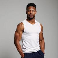 Isolated image showcasing a handsome African American male football player against a minimalistic backdrop photo