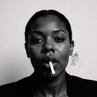 Image portrays a closeup portrait of an African American woman with focus on her face as she smokes during World No Tobacco Day photo